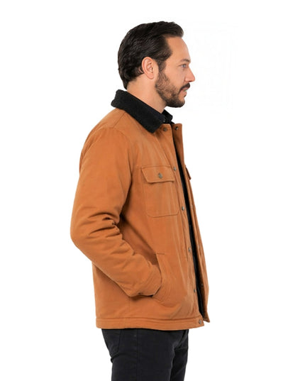 Man wearing a brown jacket with black collar on a white background