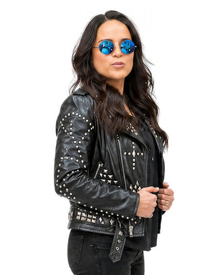 Woman wearing a biker jacket on a white background 