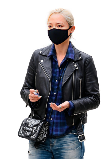 Person wearing a black leather jacket, plaid shirt, and jeans with a black face mask on a white background.