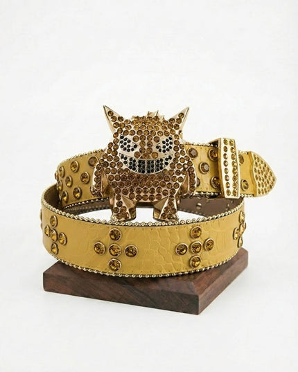Gold belt with rhinestone tiger design on a wooden stand against a white background