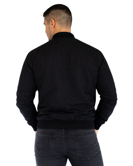 Man wearing a black jacket on a white background