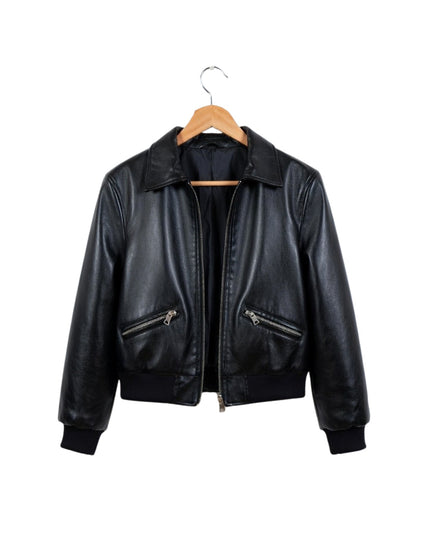 Black leather jacket on a wooden hanger against a white background