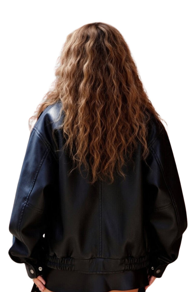 Person wearing a black jacket from behind on a white background