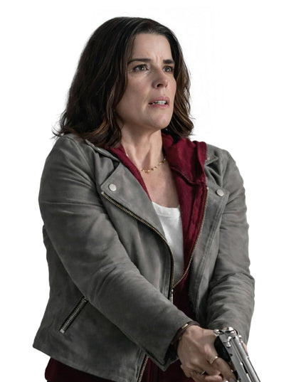 Woman Wearing a grey biker jacket on a white background.