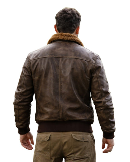 Man wearing a brown leather jacket with fur collar on a white background