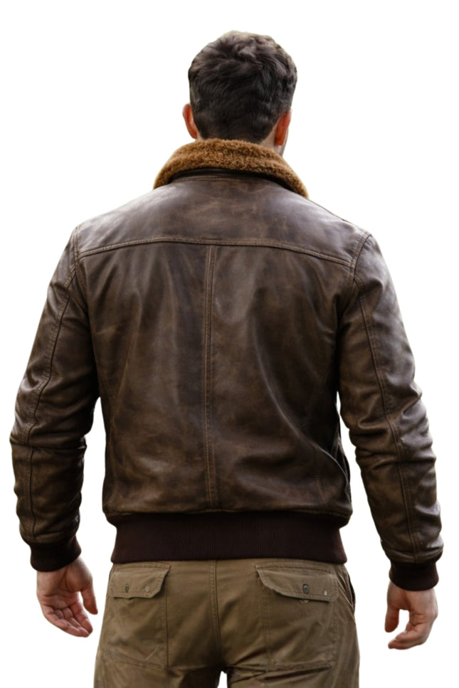 Man wearing a brown leather jacket with fur collar on a white background