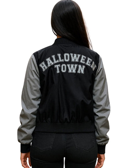 Black and gray jacket with 'HALLOWEEN TOWN' text on the back, worn by a person.