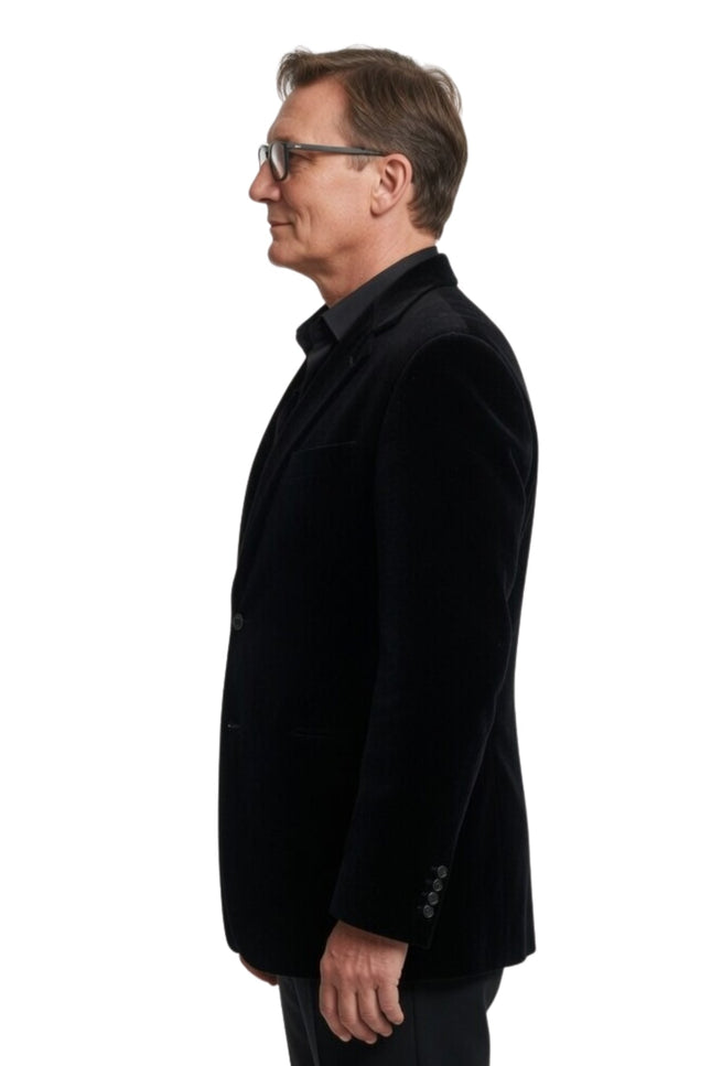 Man wearing a black coat on a white background