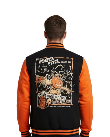 Person wearing a Halloween-themed black and orange jacket with graphics on the back.