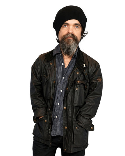 Man wearing a black jacket and beanie on a white background
