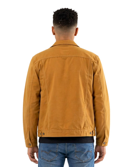 Man wearing a mustard yellow jacket on a white background