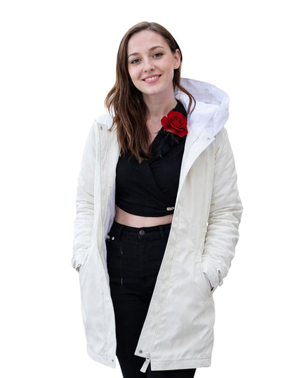 Woman wearing a white hooded jacket on a white background