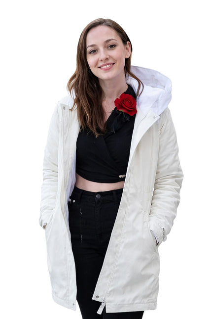 Woman wearing a white hooded jacket on a white background