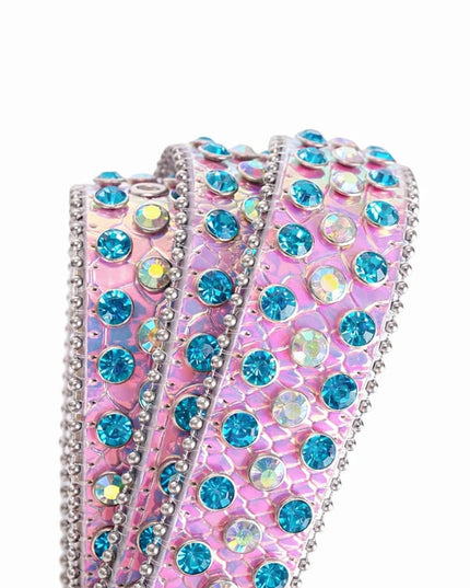 Pink and blue embellished ribbon on a white background