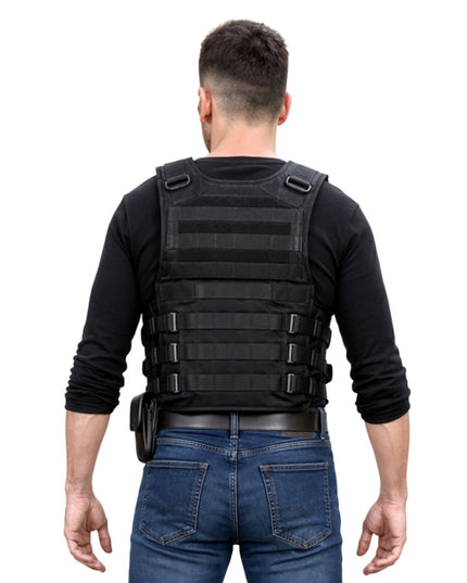 Person wearing a black tactical vest on a white background