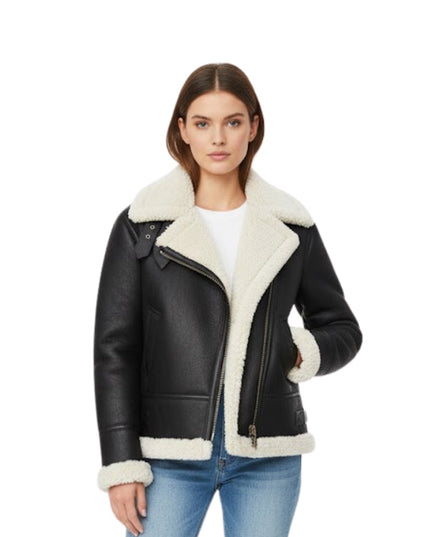 Woman wearing a black leather jacket with white fur trim on a white background
