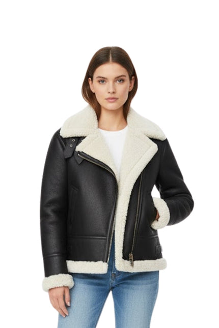 Woman wearing a black leather jacket with white fur trim on a white background