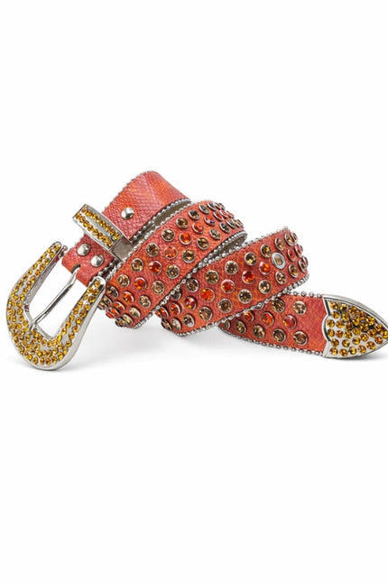 Orange belt with decorative studded buckle on a white background
