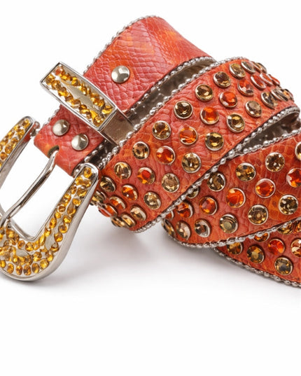 Orange belt with gold and silver embellishments on a white background