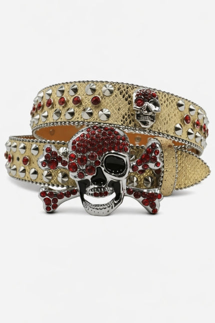 Skull-themed belt with red gemstones and gold accents on a white background