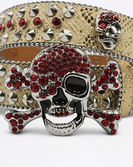 Belt with skull design and red gemstones on a white background