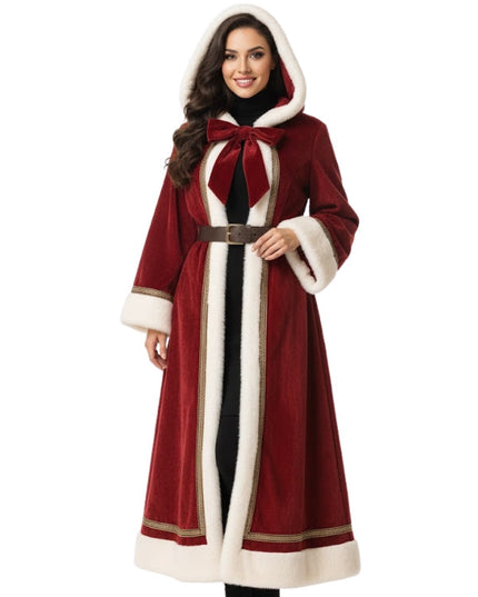Woman wearing a red coat with white fur trim on a white background