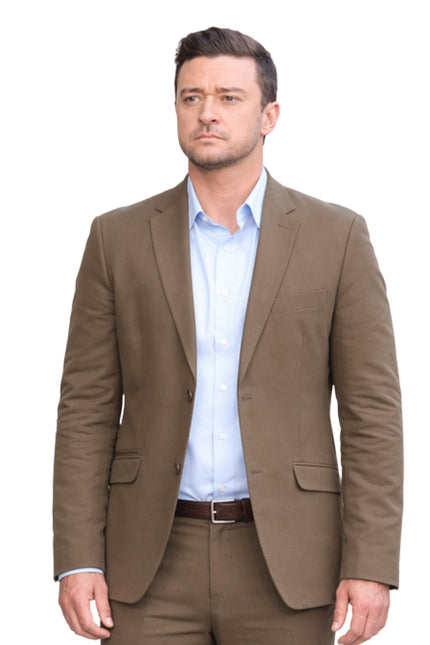Man wearing a brown suit jacket over a light blue shirt on a white background
