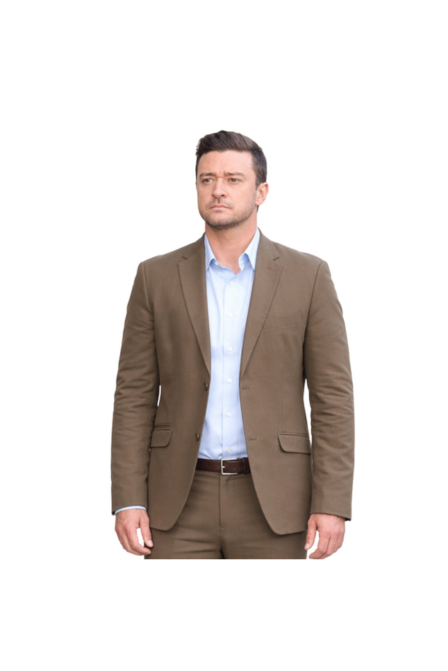 Man wearing a brown suit jacket over a light blue shirt on a white background