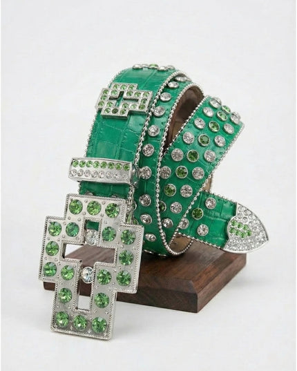 Green high-heeled shoes with rhinestone embellishments on a white background
