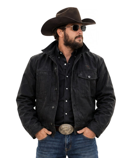 Man wearing a black jacket, jeans, and a cowboy hat on a white background
