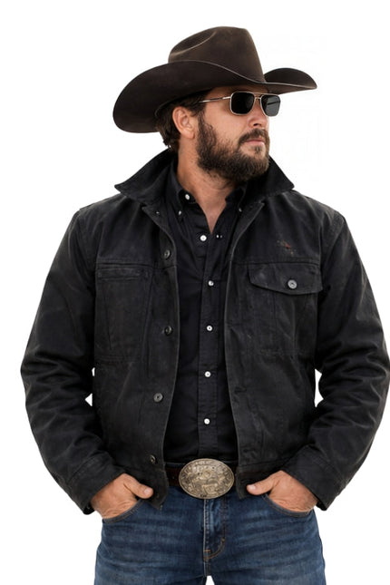 Man wearing a black jacket, jeans, and a cowboy hat on a white background