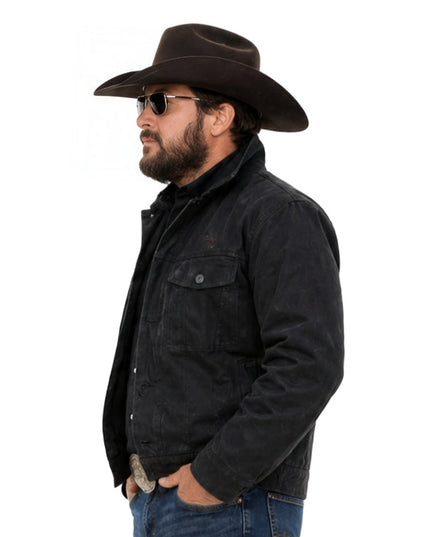 Man wearing a black cowboy hat, sunglasses, and a black jacket on a white background