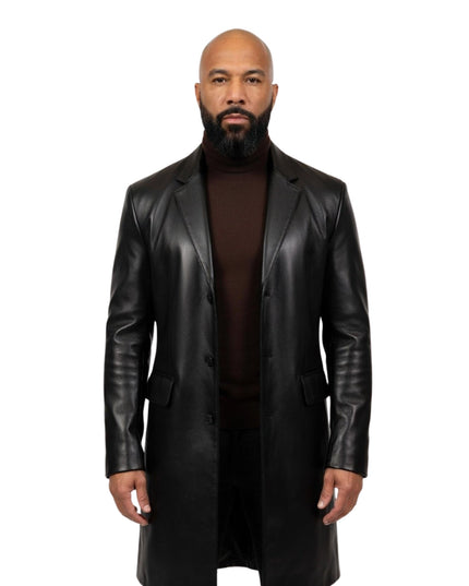 Man wearing a black leather coat on a white background