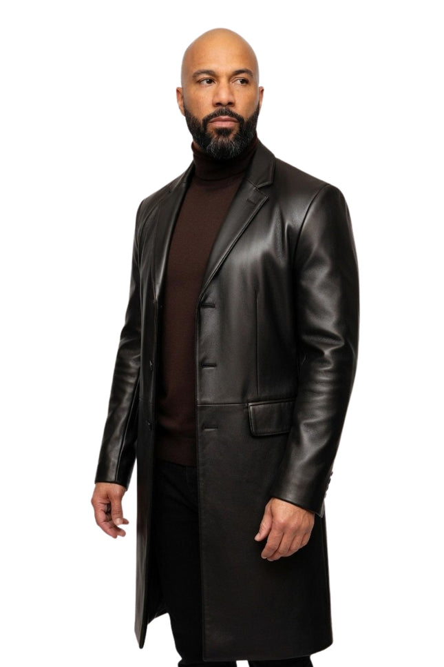 Man wearing a black leather coat on a white background