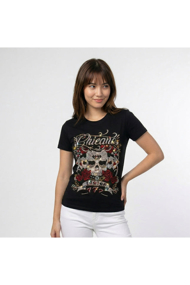 Woman wearing a black t-shirt with a graphic design on a white background