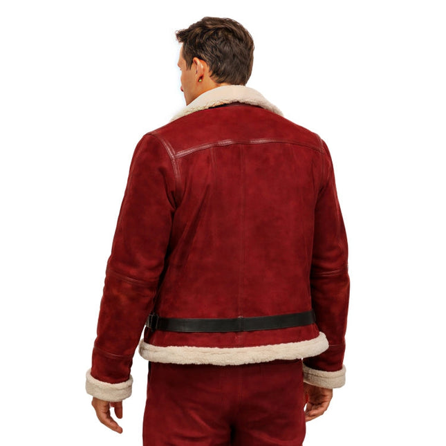 Red suede jacket with white fur lining worn by a person on a white background