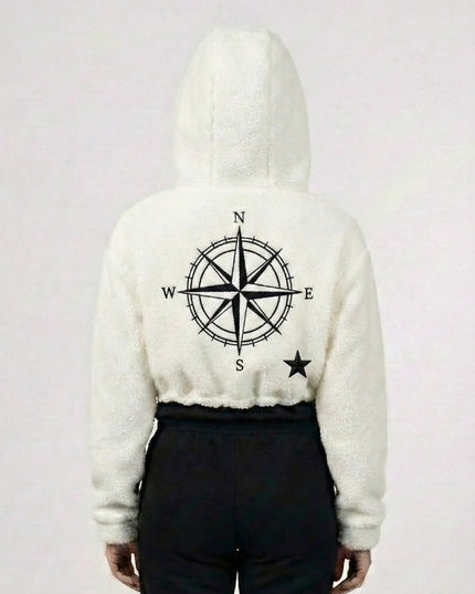 White hoodie with a compass design on the back against a white background
