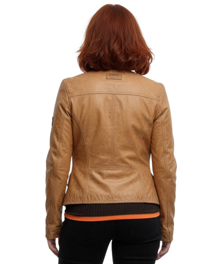 Person wearing a tan leather jacket on a white background