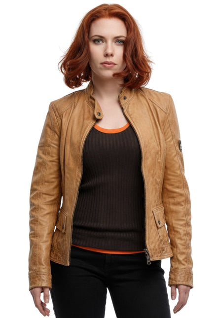 Woman wearing a tan leather jacket on a white background