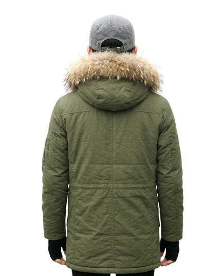 Green winter coat with fur hood on a white background