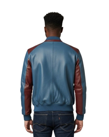 Person wearing a blue and brown leather jacket on a white background