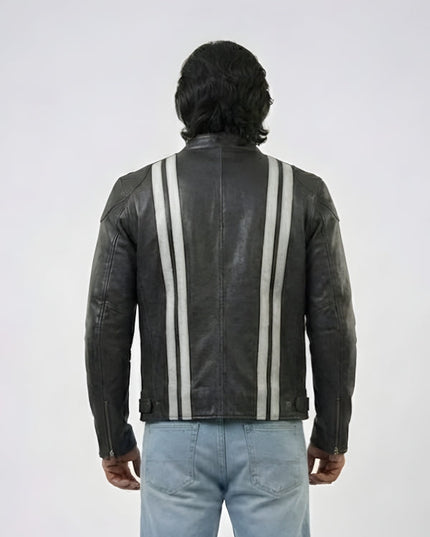 Person wearing a black leather jacket with white stripes on a white background