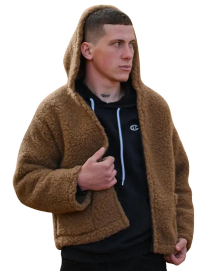 Man wearing a brown fleece jacket on a white background