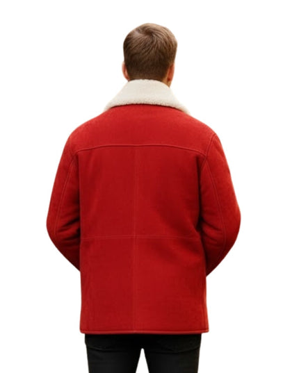 Red jacket with white fur collar worn by a person on a white background