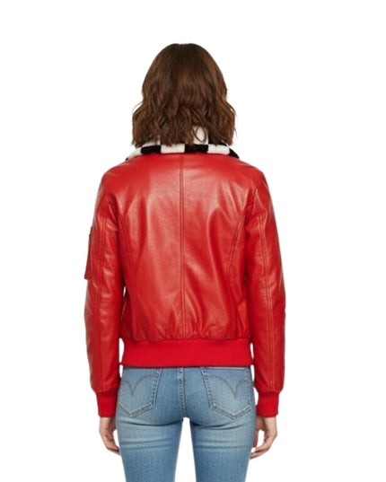 Person wearing a red leather jacket and blue jeans on a white background
