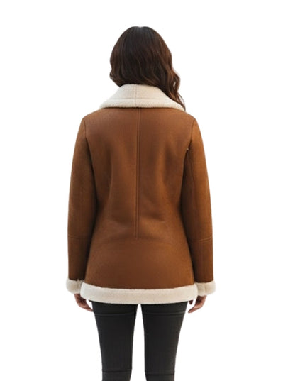 Brown coat with white trim worn by a person on a white background