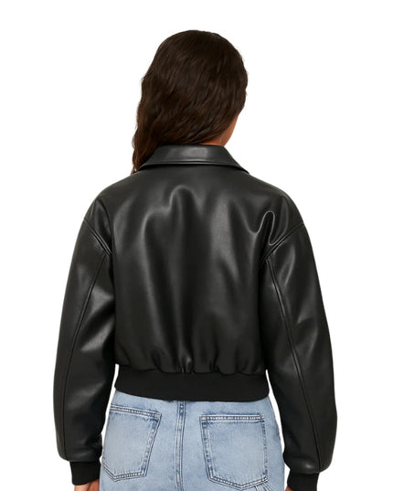 Person wearing a black leather jacket on a white background