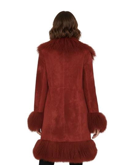 Red fur-trimmed coat worn by a person on a white background