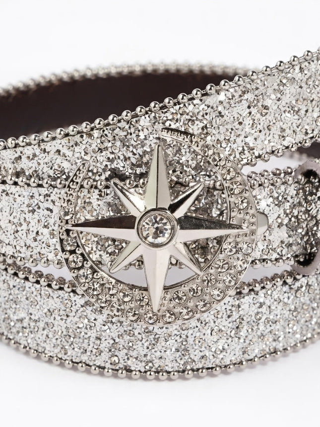 Silver belt buckle with star design on a glittery belt