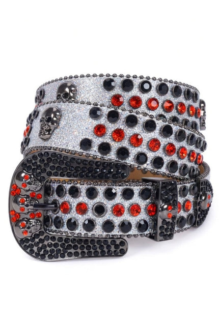 Belt with black and red gemstones on a white background